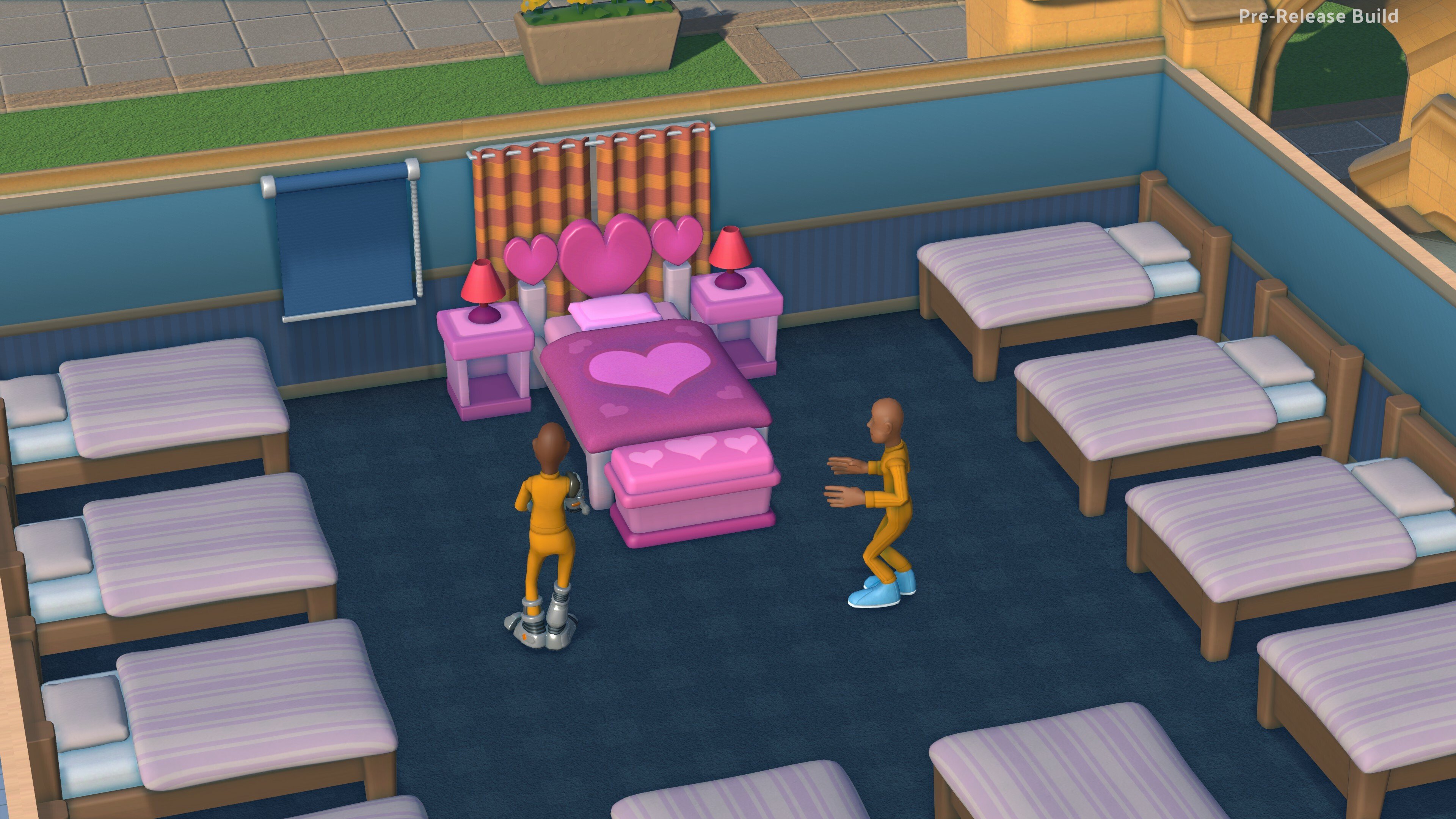 Two students standing next to the Double Jump Bed in