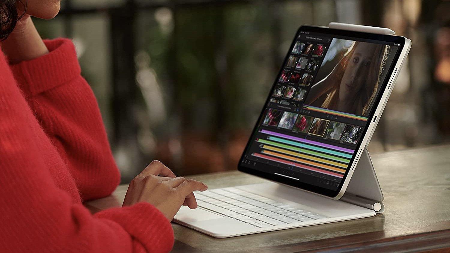 a person uses the attached keyboard on their ipad