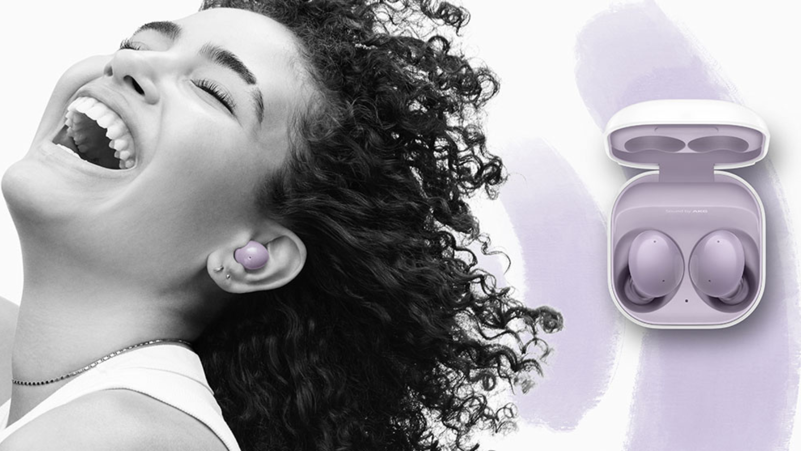 woman in black and white wearing purple galaxy buds 2 with earbuds in case next to her
