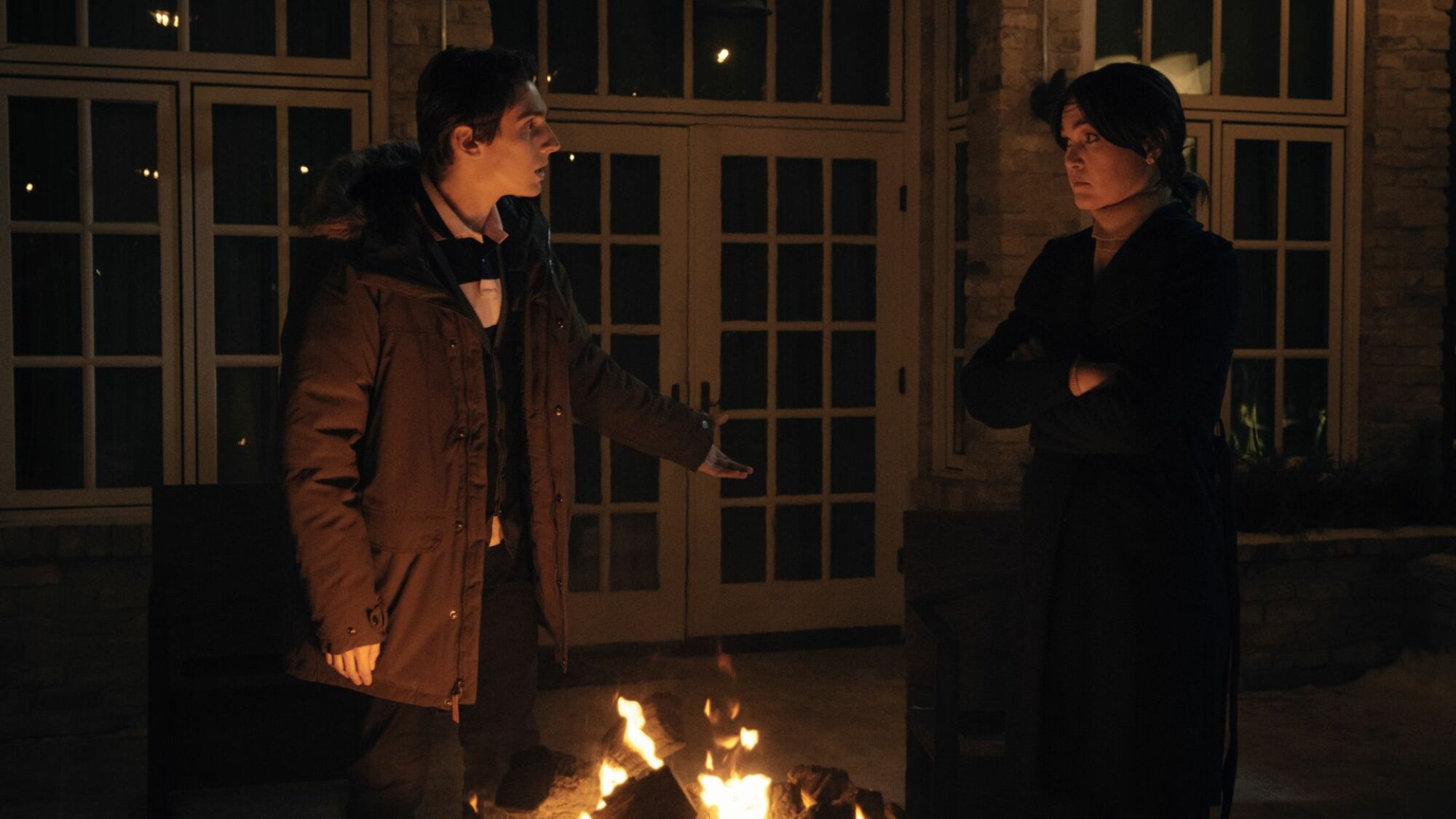 Matthew Finlan as Gunnar Albright and Julia Stiles as Tricia Albright in "Orphan: First Kill." 