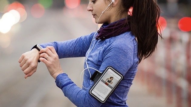 Person wearing a phone with the Jillian Michaels: Fitness App Lifetime Subscription.