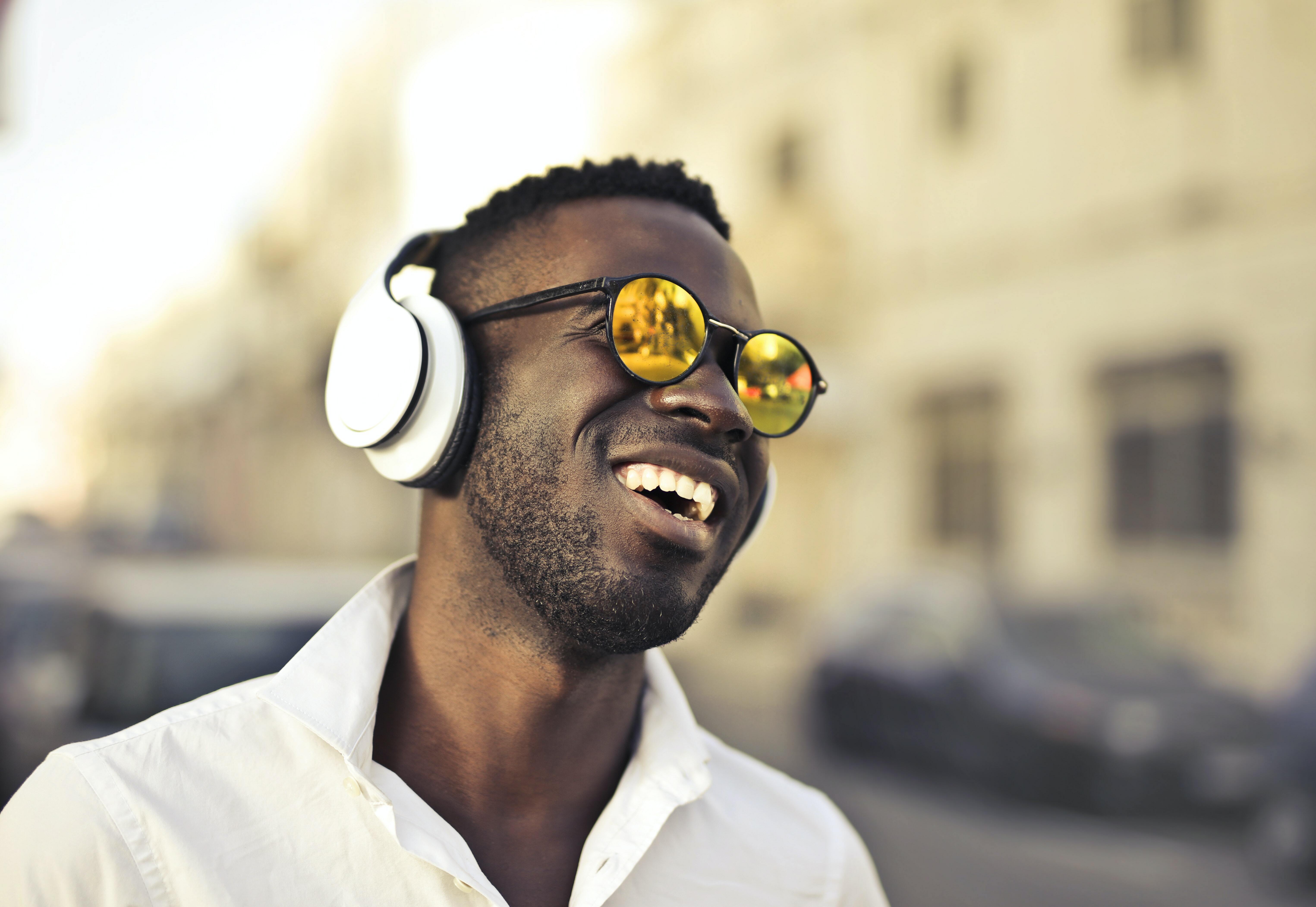 Man with headphones and sunglasses