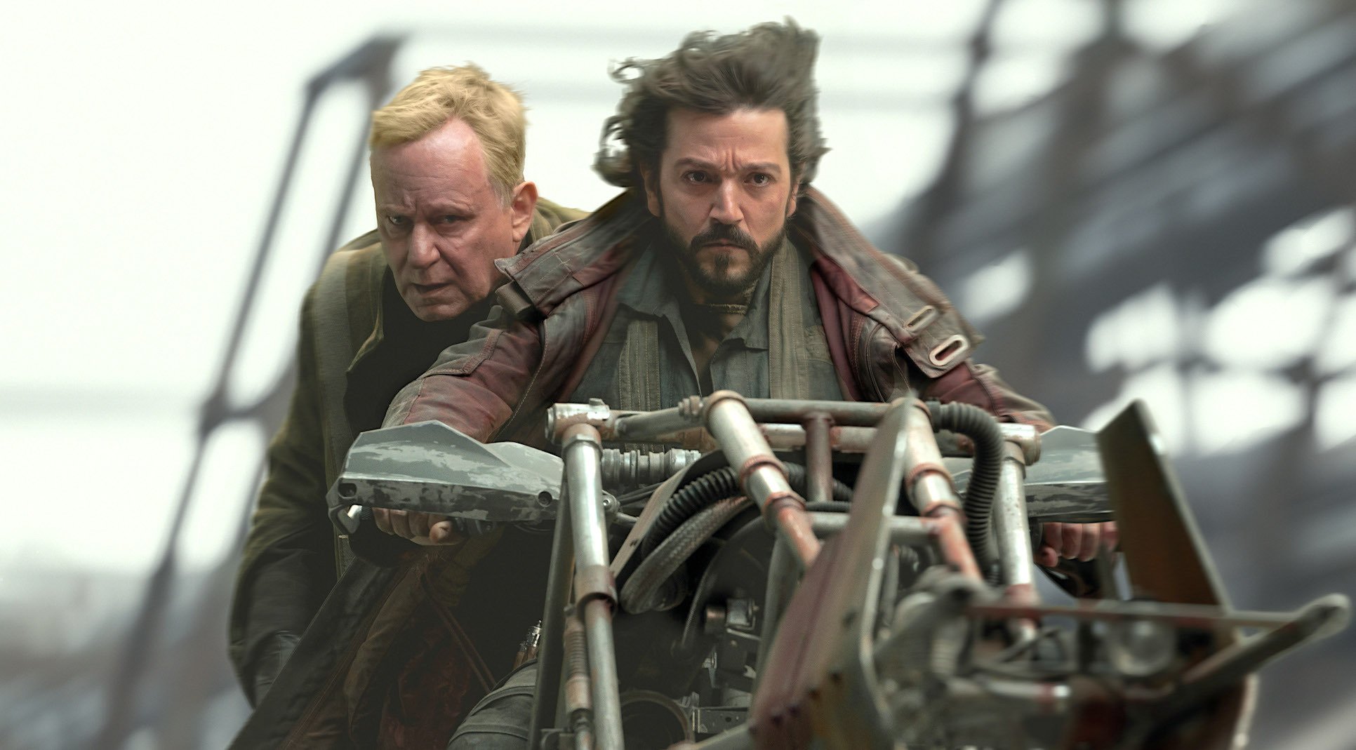 Two actors on a speeder bike