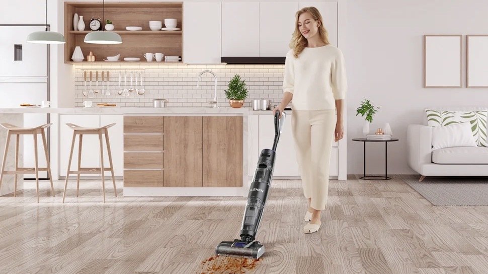 Person using the Jashen F16 Wet & Dry 2-in-1 Cordless Vacuum Mop to clean.