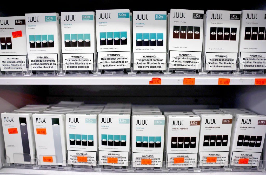 Multiple Juul products on a shelf