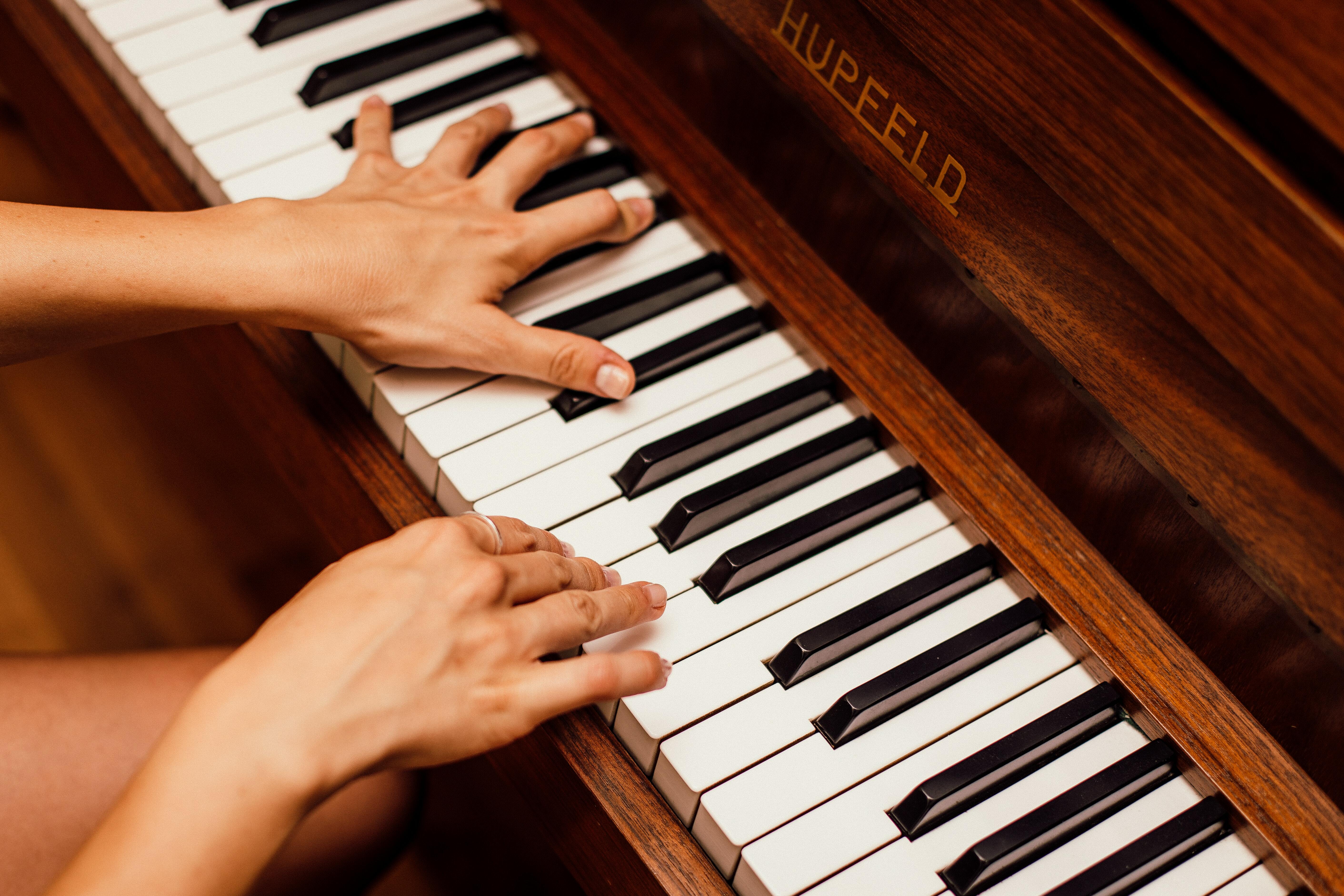 Hands on piano