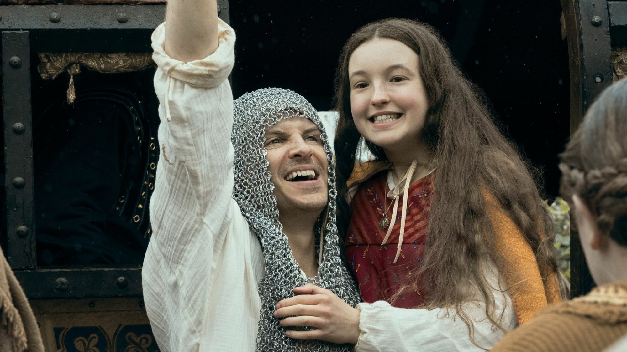 Bella Ramsey and Andrew Scott smile wide in "Catherine Called Birdy."
