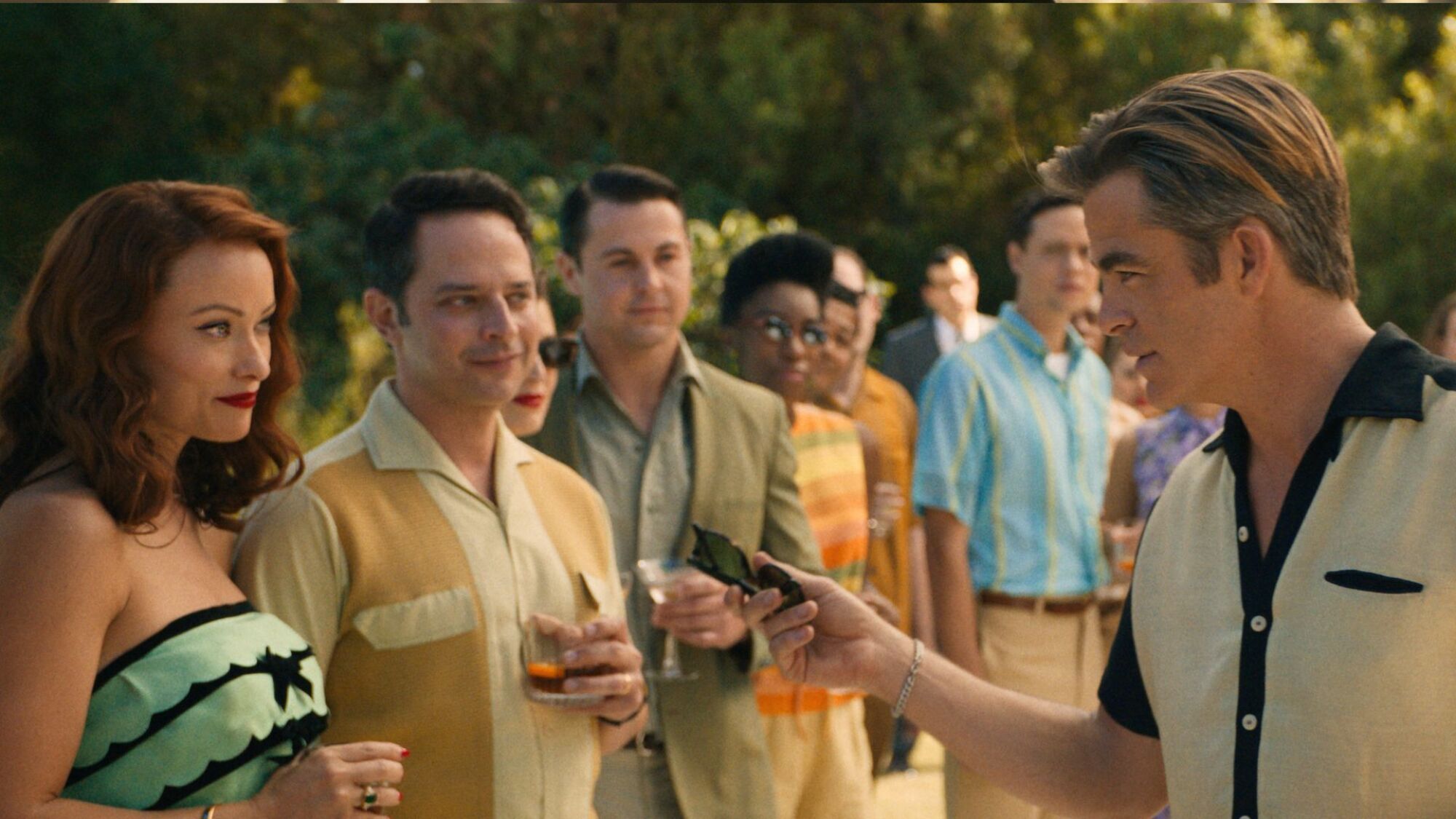 Chris Pine, Olivia Wilde, and Nick Kroll in "Don't Worry Darling."