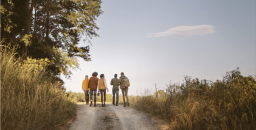 Group of people in outdoor gear on a hiking trail