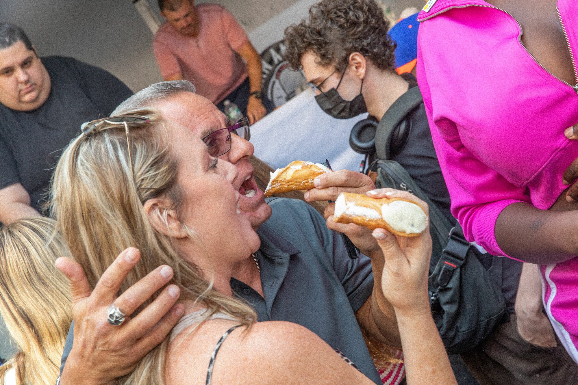 Crowd Eating Cannoli's