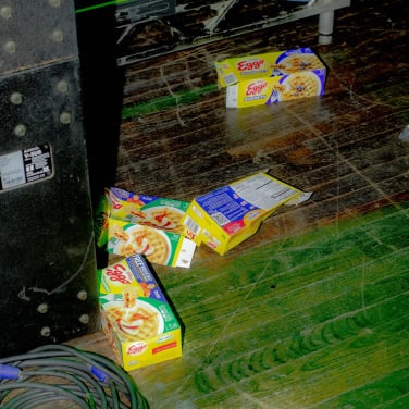 waffle boxes on floor of stage