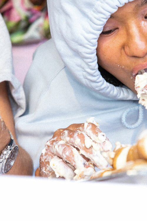 Contestant with Cannoli cream filled hand