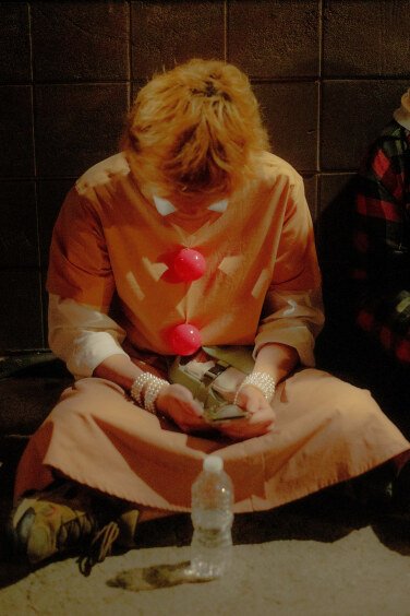 Shrek Raver sitting outside in costume