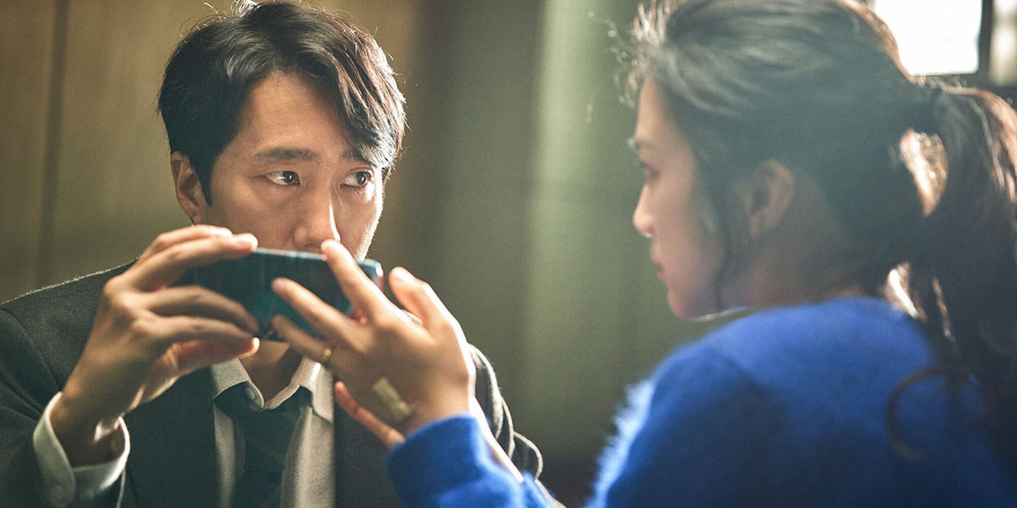 Park Hae-il and Tang Wei in "Decision to Leave."