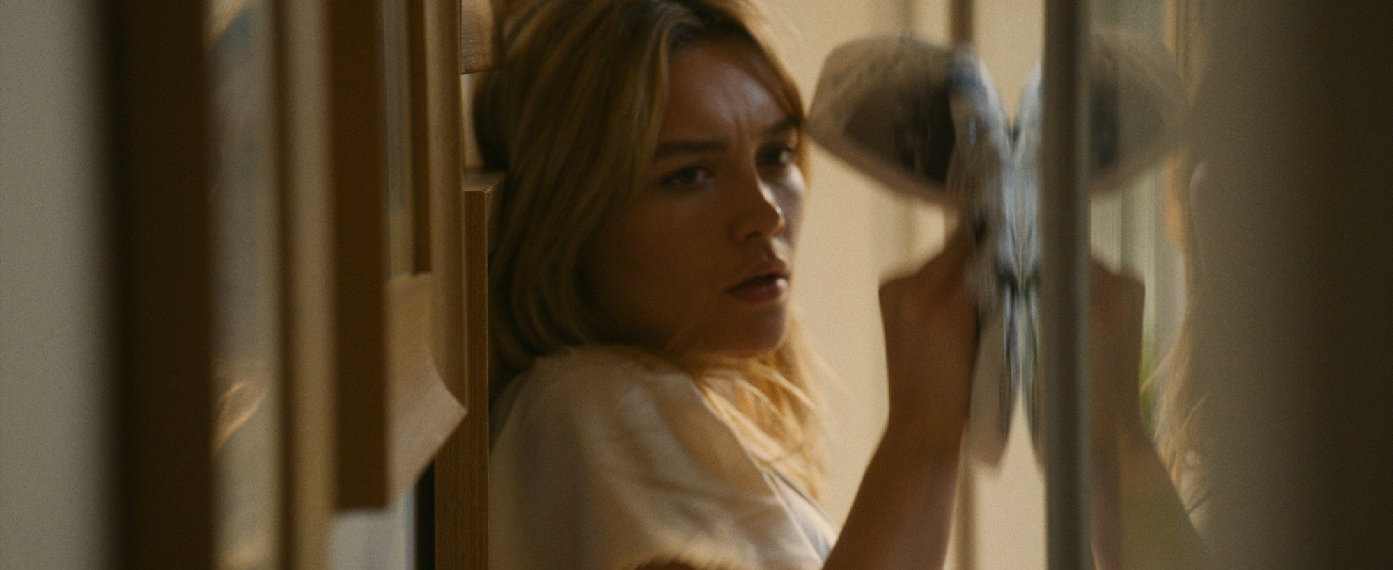 Florence Pugh gets squeezed in "Don't Worry Darling."