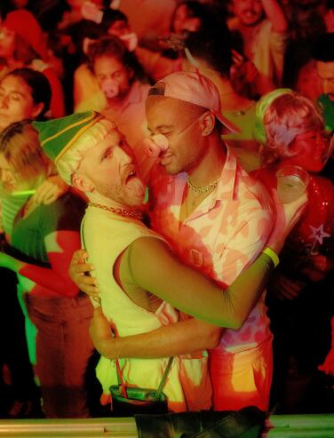 Two Shrek ravers embracing eachother
