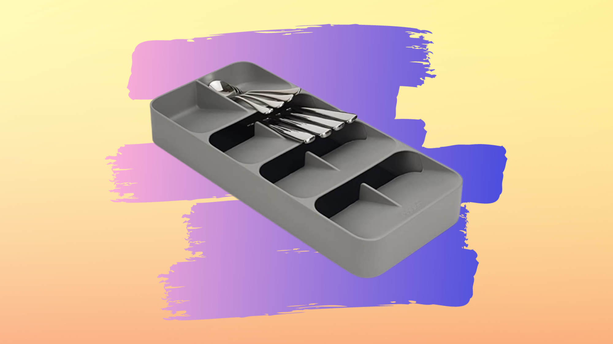 gray cutlery organizer for drawer with purple and yellow background