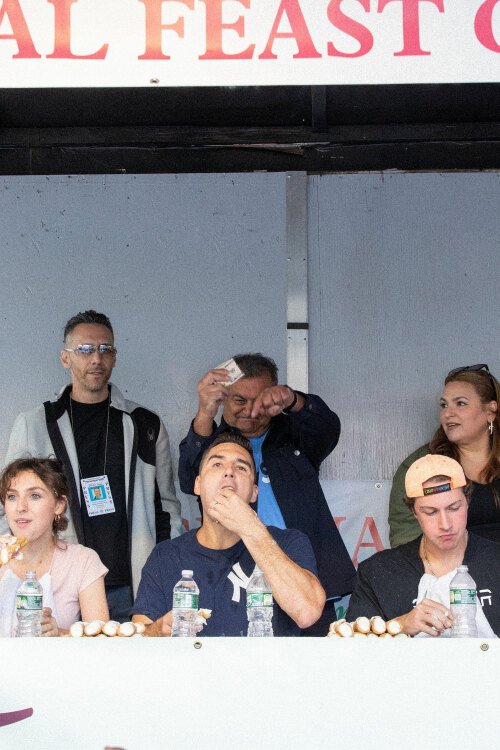 Contestant eating cannoli