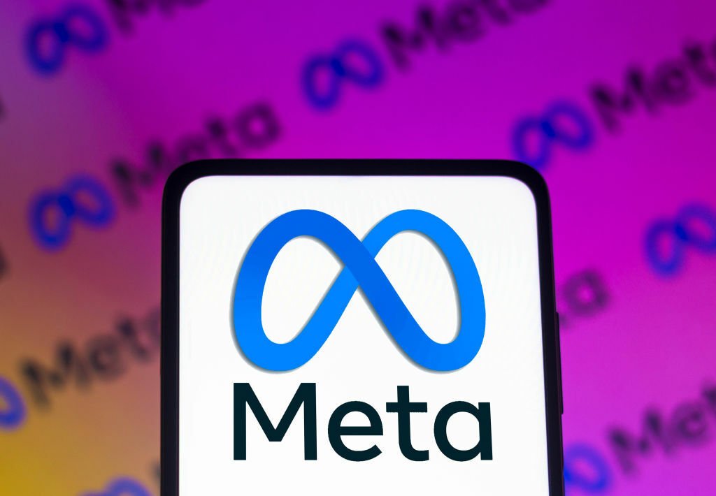 The Meta logo on a smartphone.