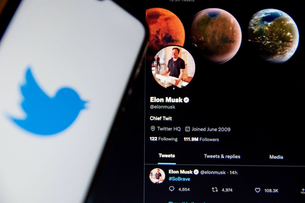 Elon Musk's twitter profile page on a smartphone