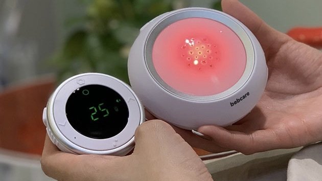 Person holding the Bebcare Hear Digital Ultra-low Emissions Audio Baby Monitor.