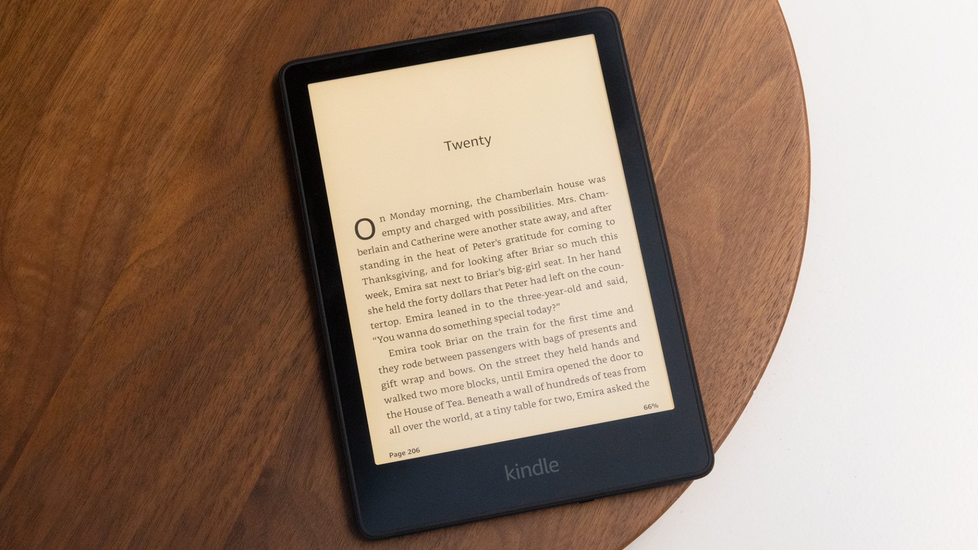 kindle with text open onscreen with orange lighting