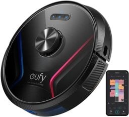 Eufy Robovac X8 beside smartphone with map on screen
