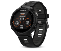 Garmin Forerunner 735XT watch with running metrics on screen