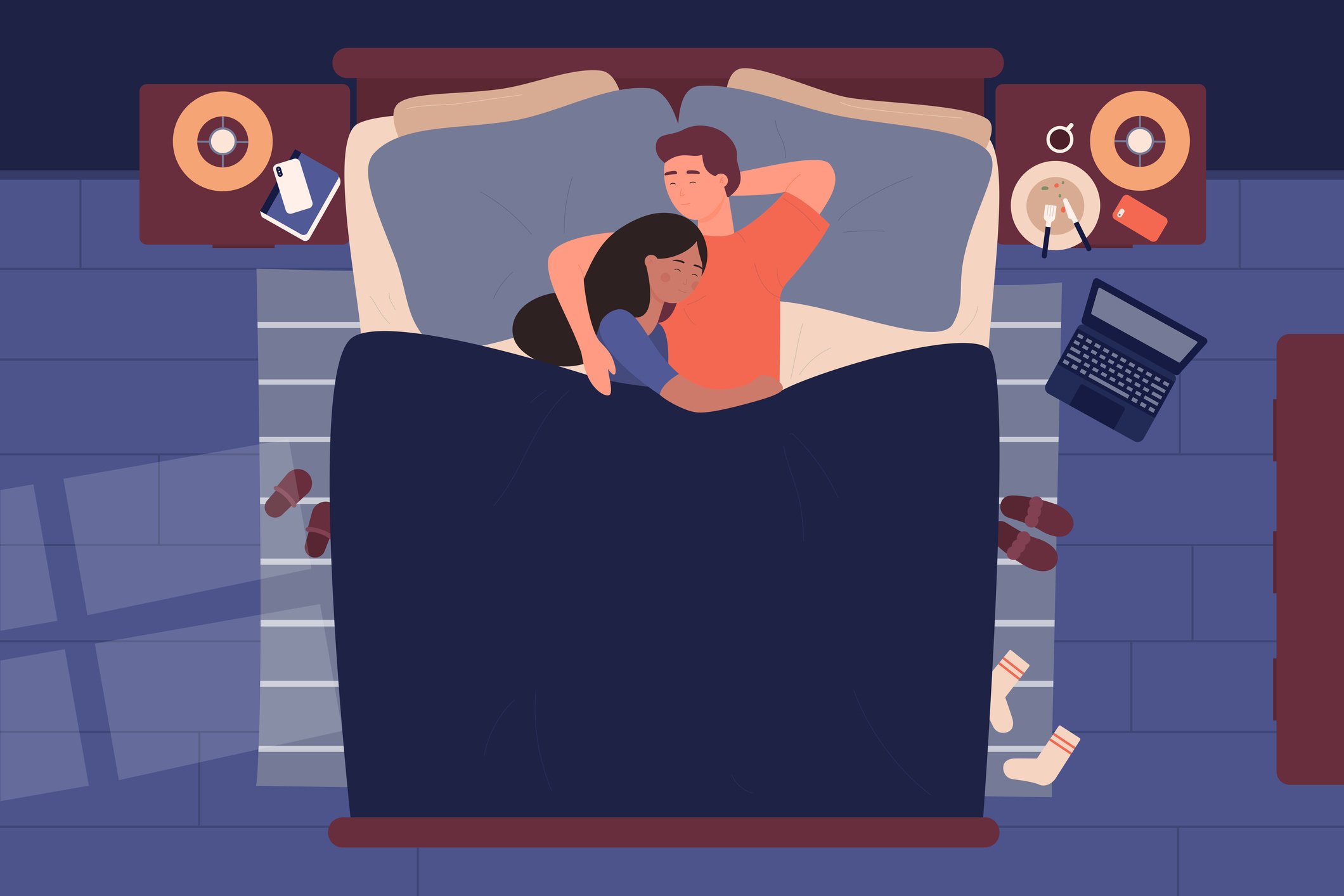 Man and woman in bed at night. 