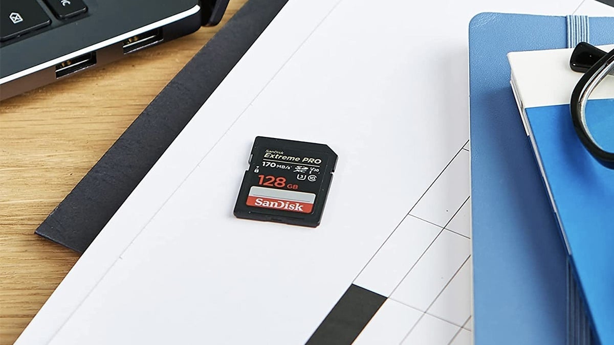 The SanDisk Extreme Pro 128GB SD Card on a desk.