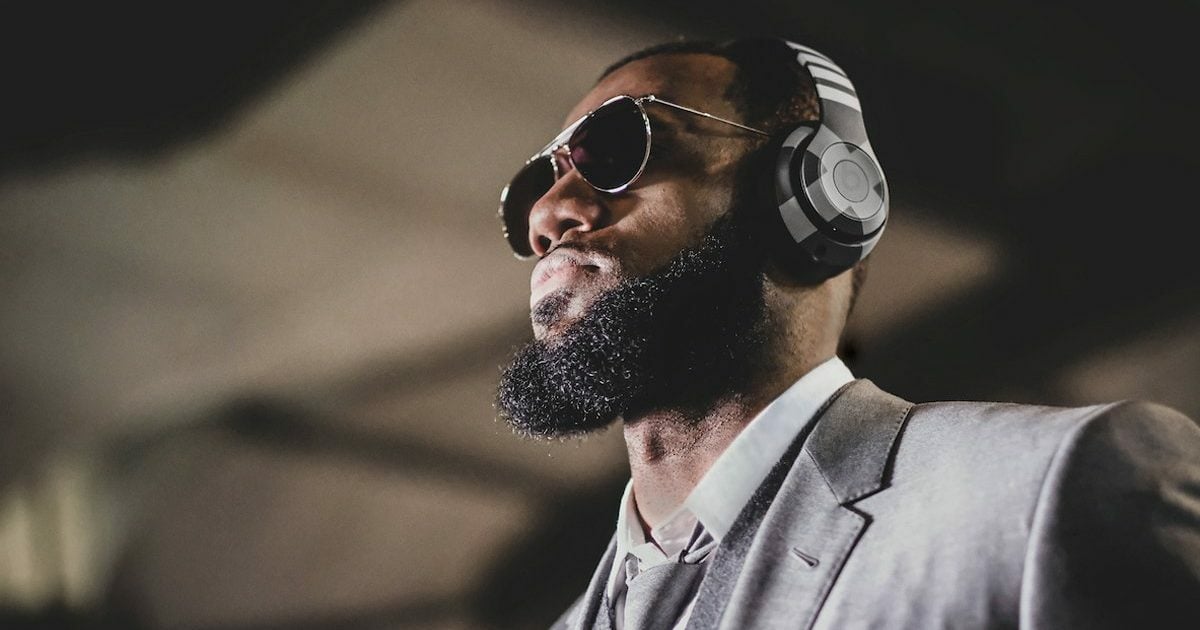 Basketball player Lebron James is wearing headphones from the company Beats