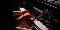 Hands on piano