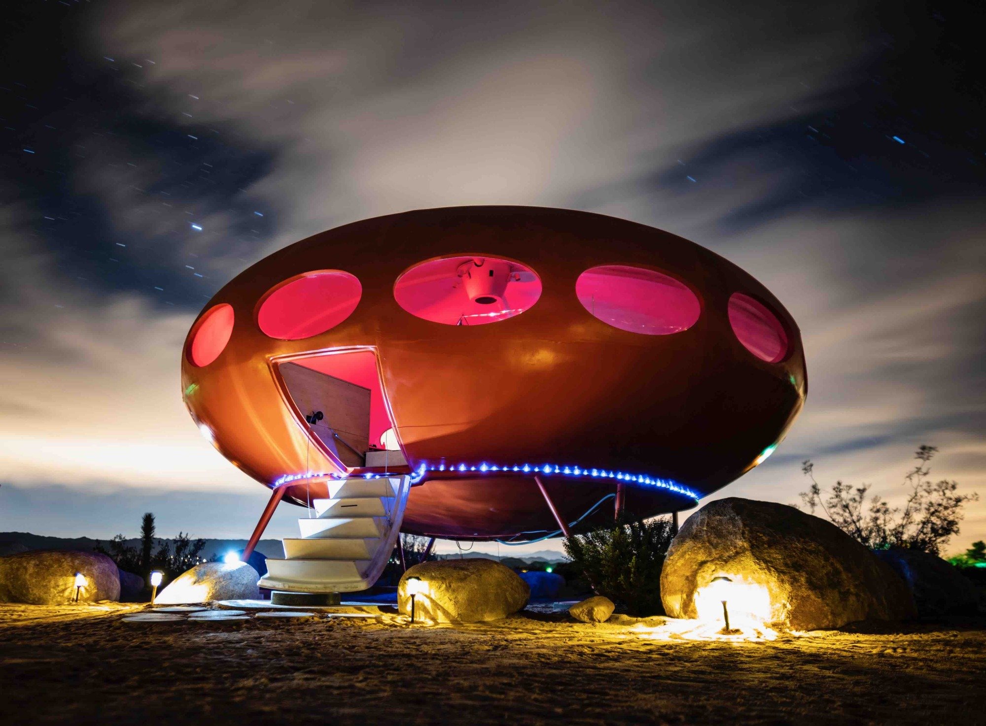 An Airbnb listing in the shape of a UFO