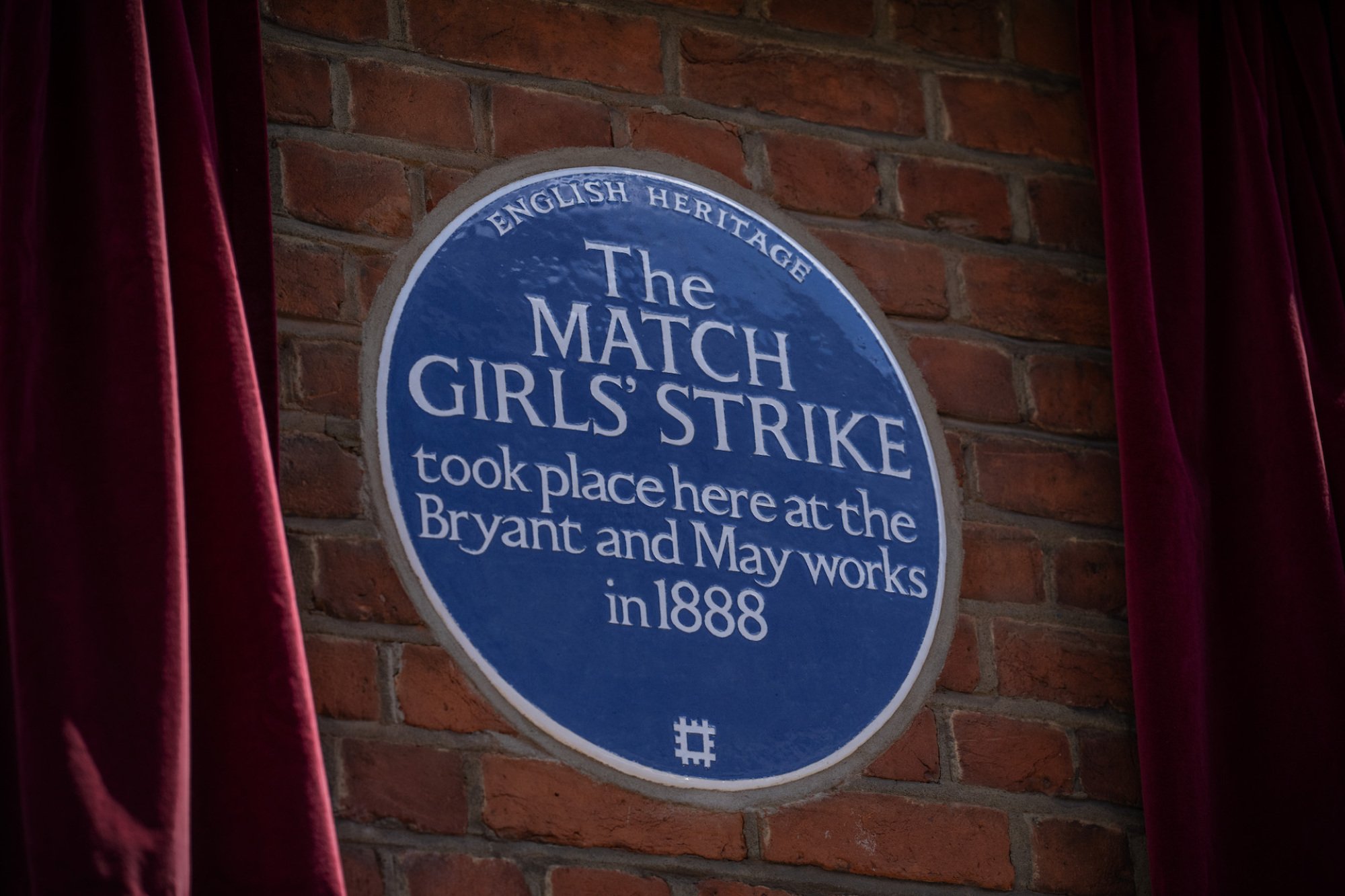 A newly-unveiled blue plaque dedicated to the matchgirls strike is pictured at the former Bryant and May match factory on July 5, 2022 in London, England.