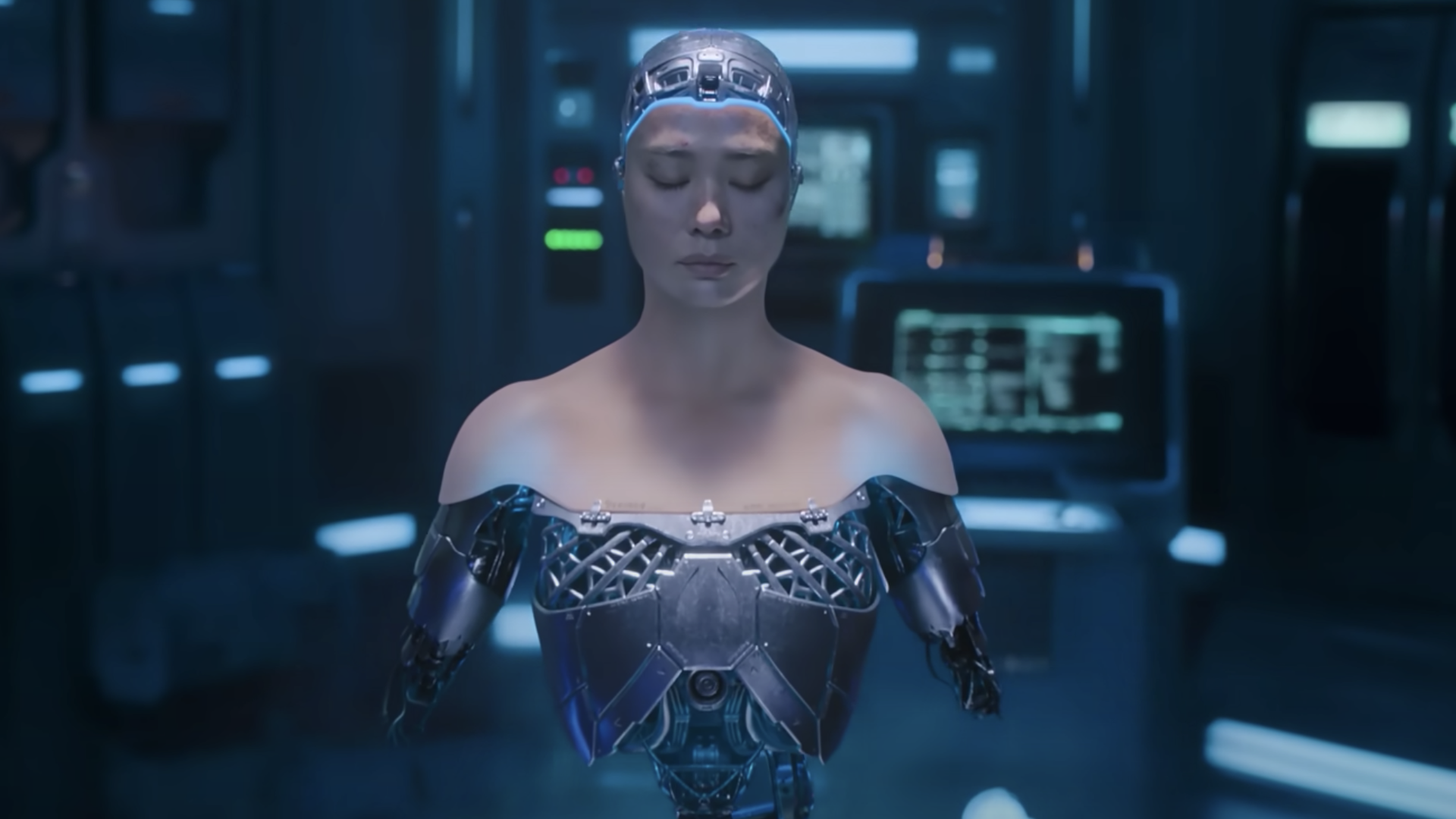 A humanoid robpt in a lab, which seems to be only torso and head so far.