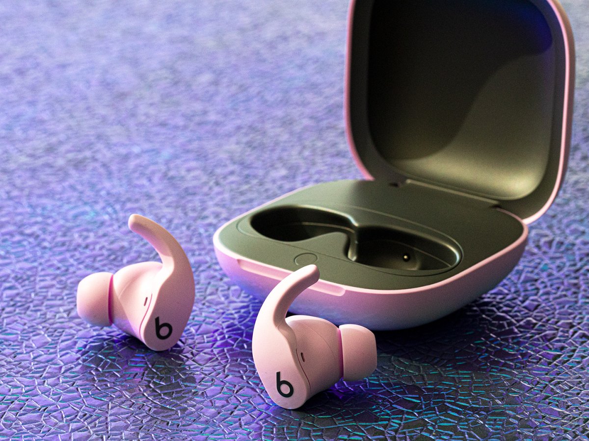 Beats Fit Pro outside charging case on table