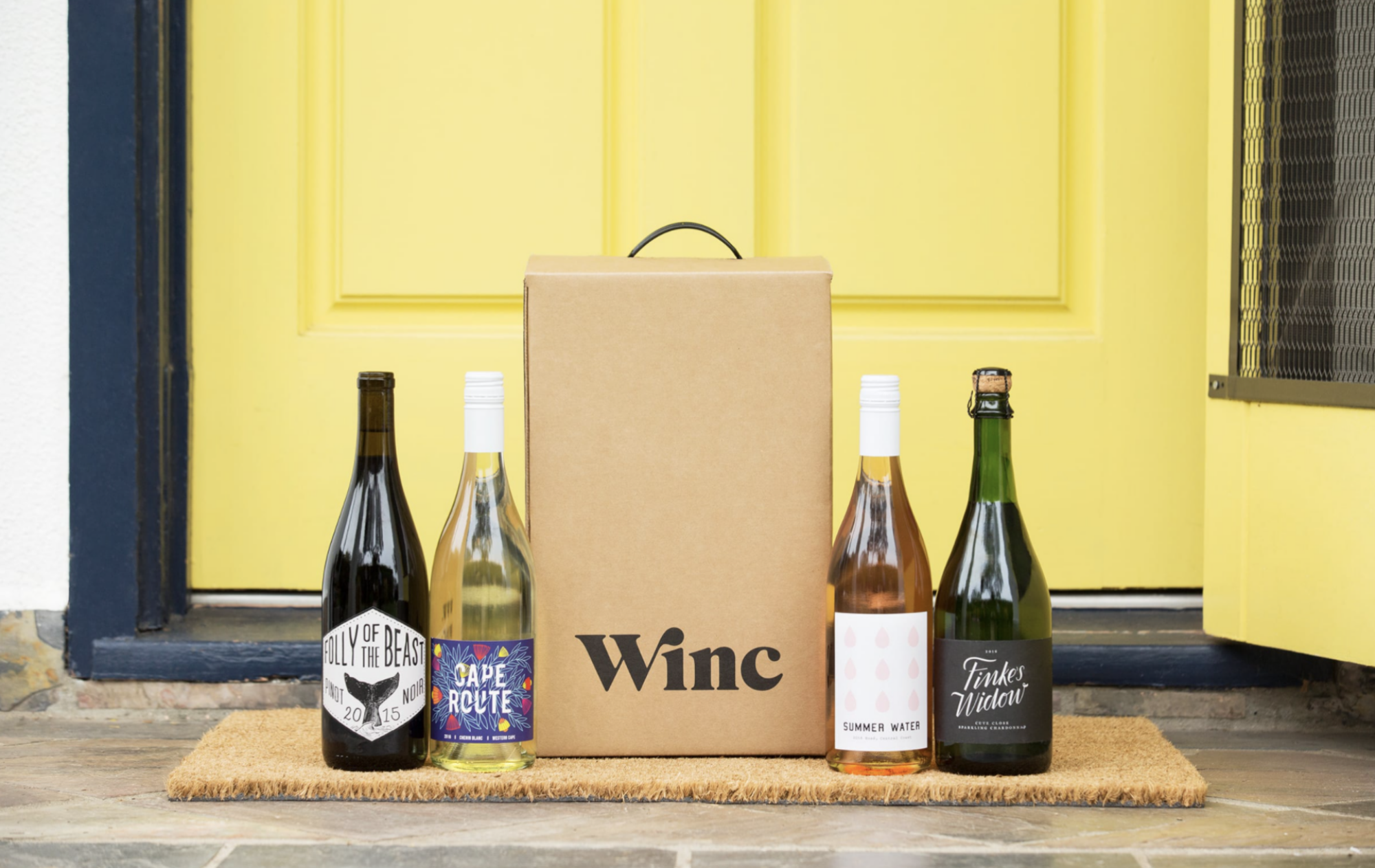 wine delivery sitting on someone's doorstep