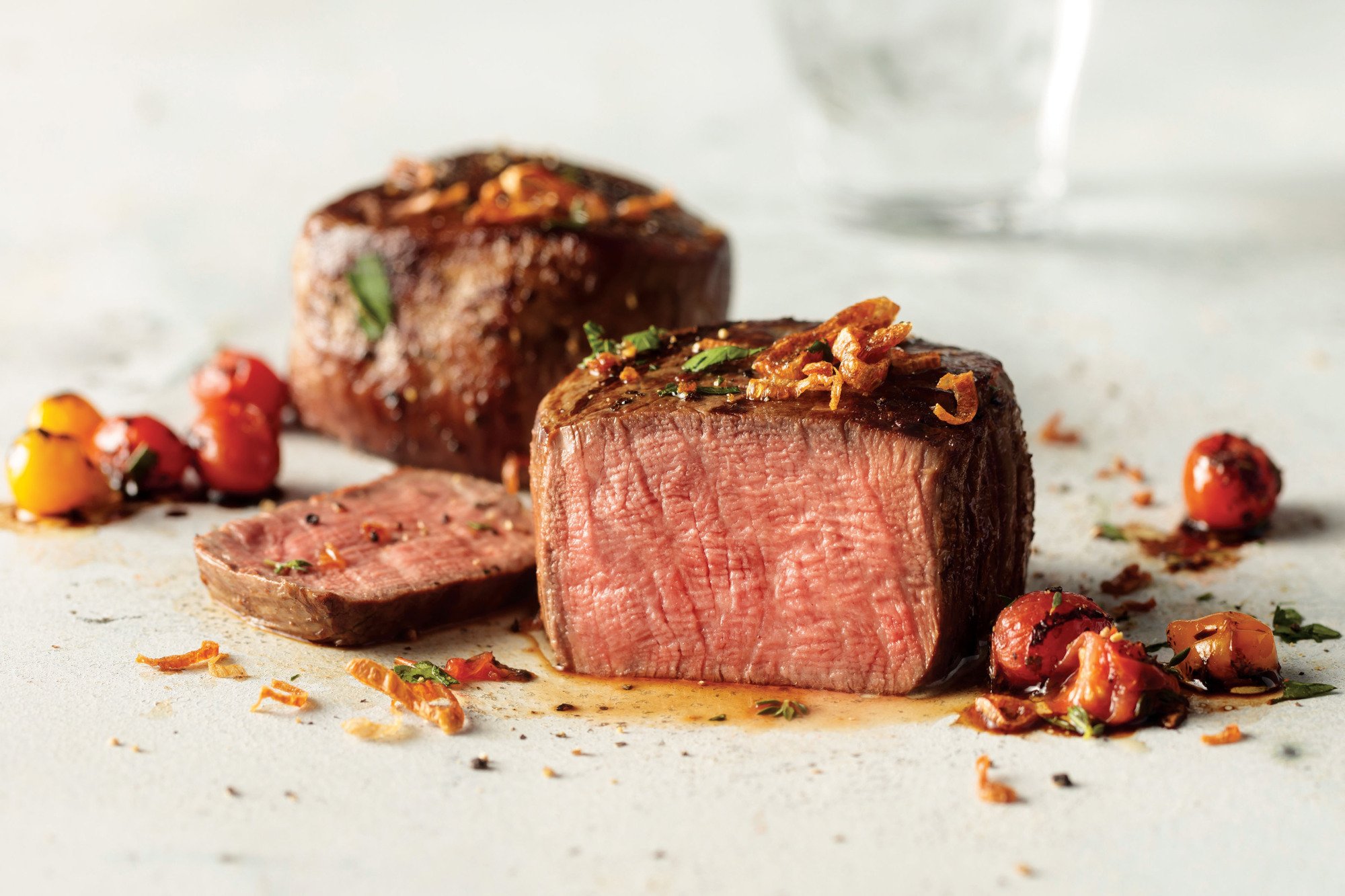 Medium well steak with vegetables on plate