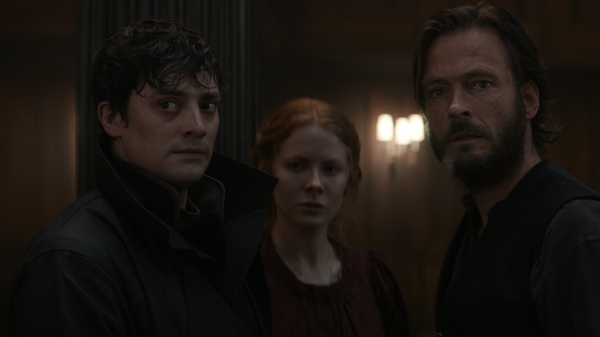 Three characters in 19th century garb stare in concern.