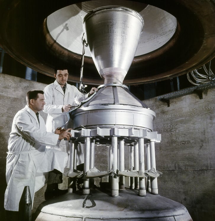 Technicians preparing a Kiwi nuclear reactor nozzle for testing