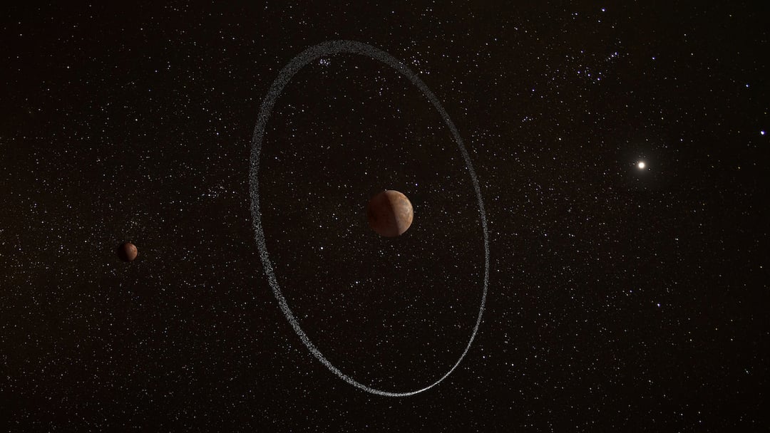 rings around a dwarf planet in our solar system (illustration)