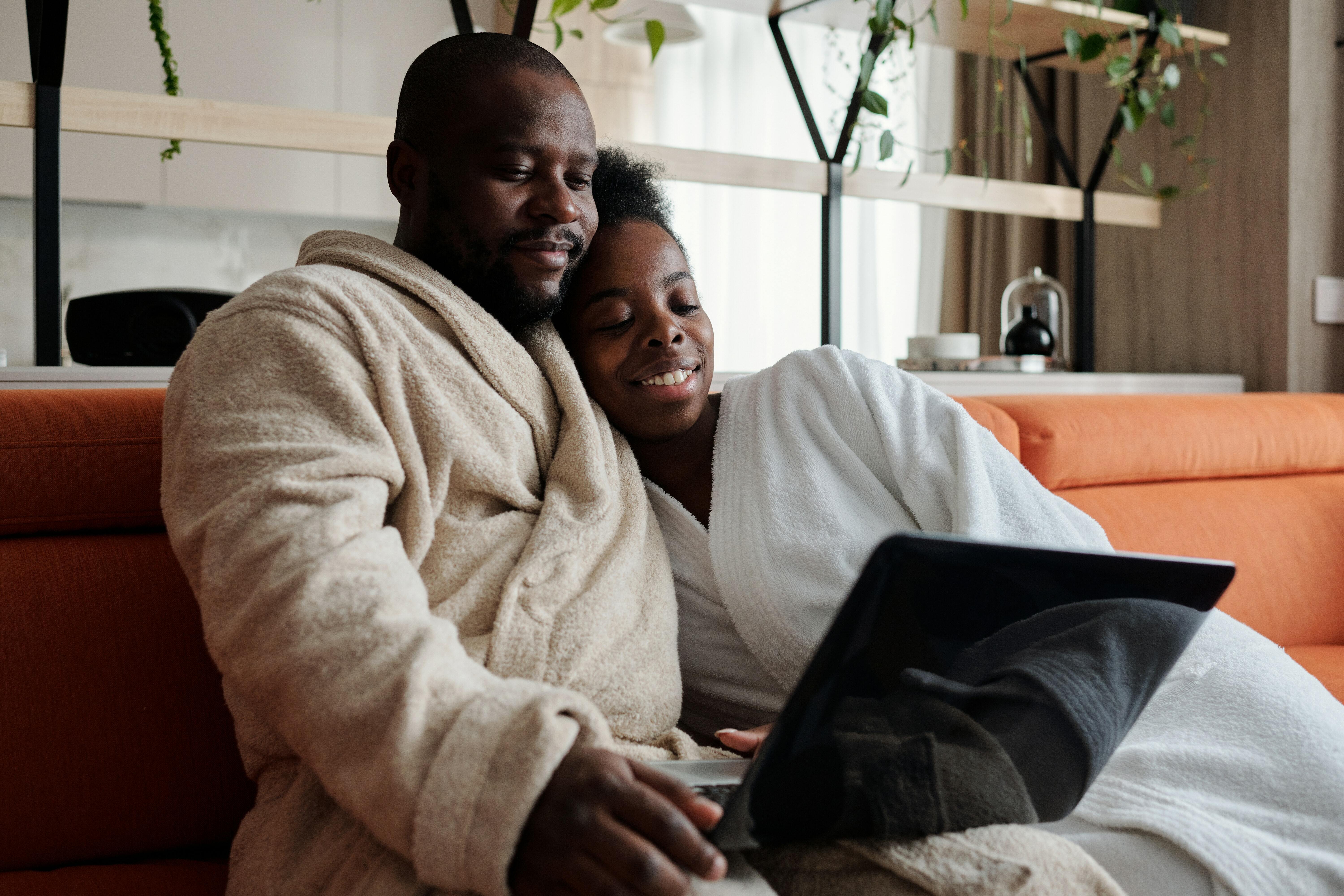 Couple looking at laptop
