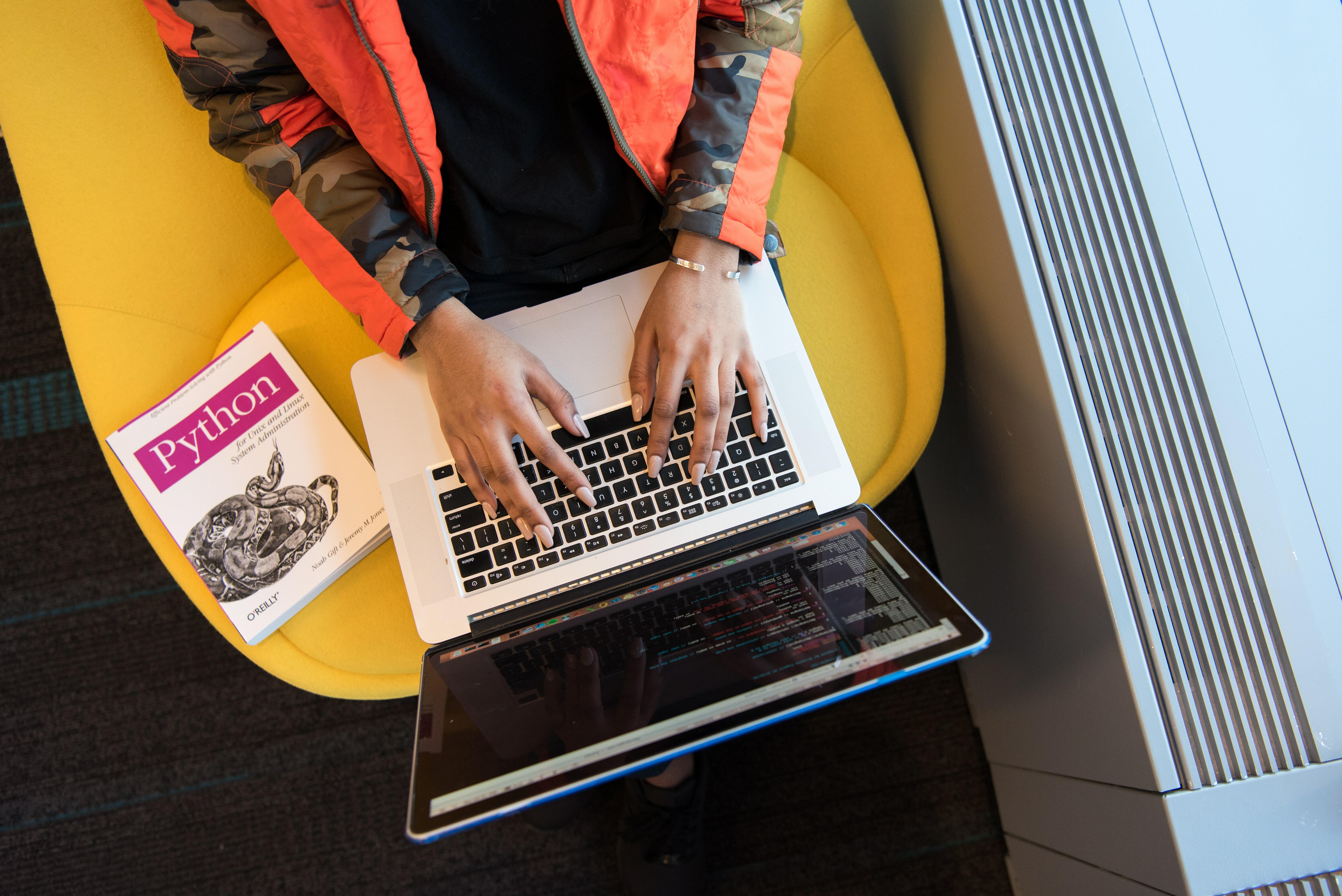 Laptop and Python book