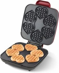 dash heart mini waffle maker with six mini waffles inside