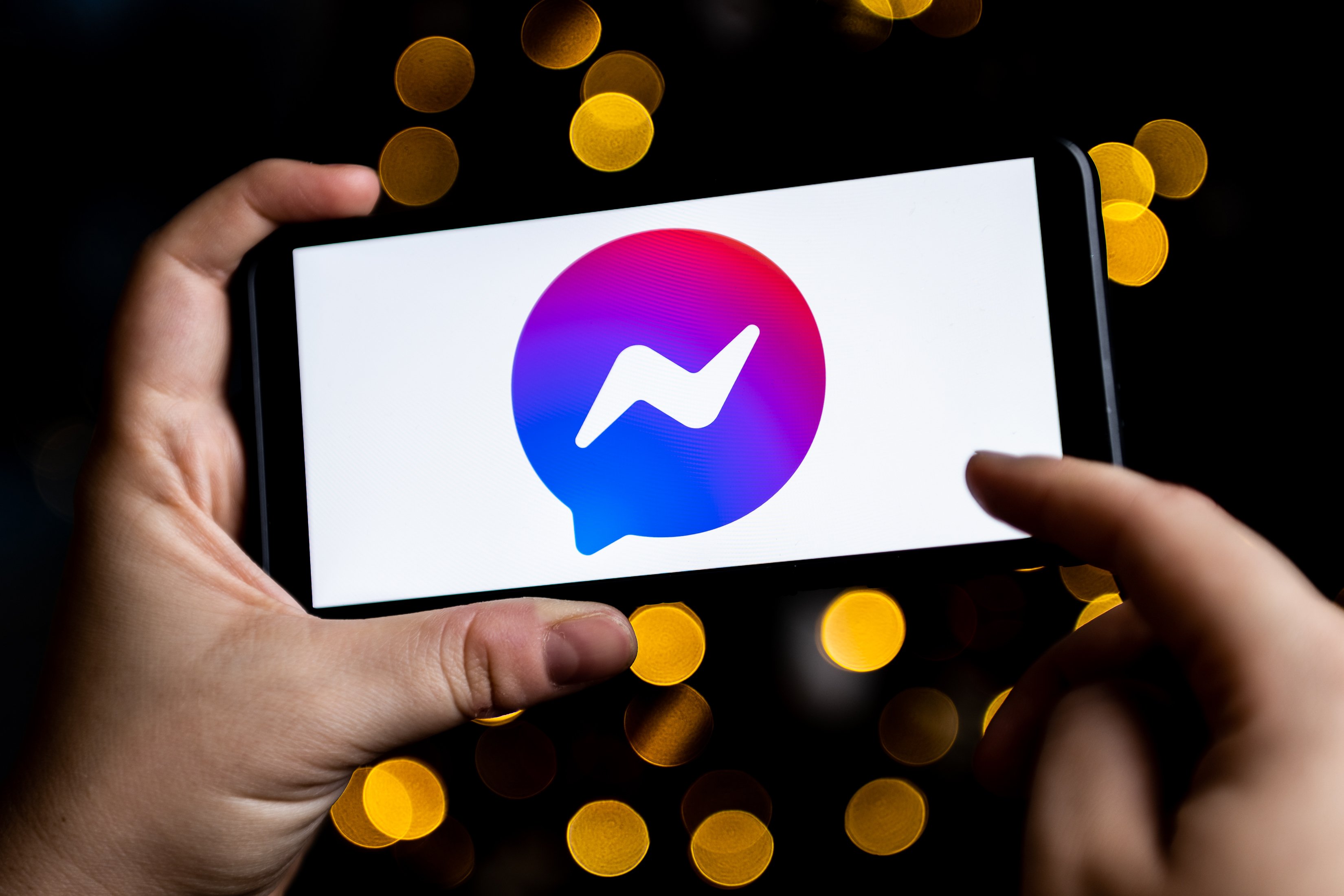 In this photo illustration a Facebook Messenger logo seen displayed on a smartphone. 