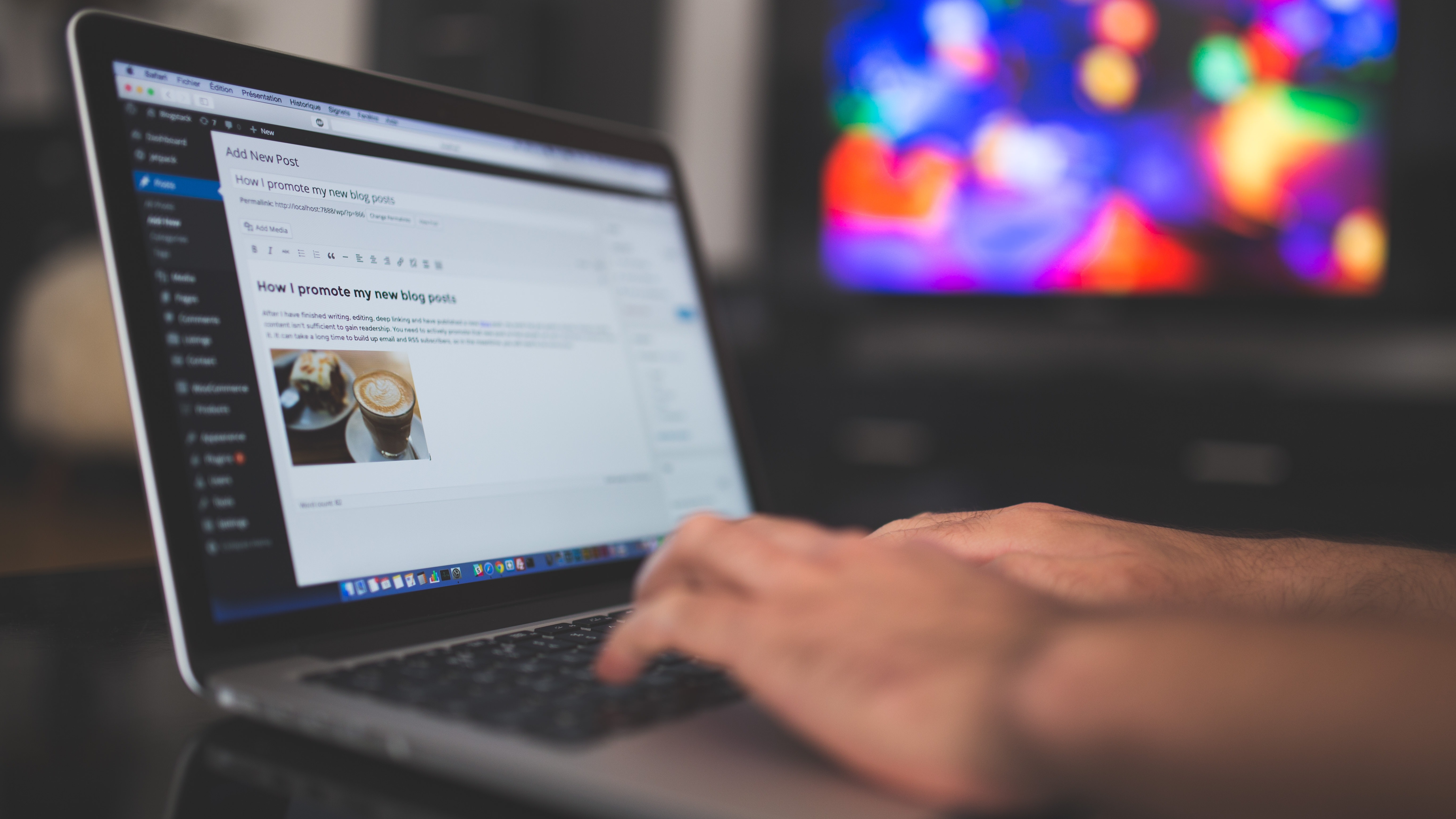 person blogging on a laptop