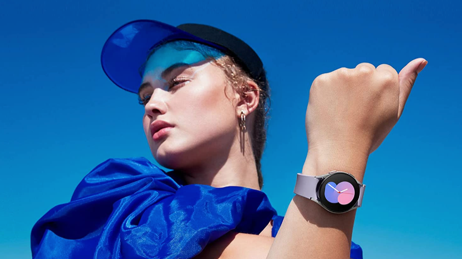 Person with a blue jacket wearing a smartwatch on left wrist