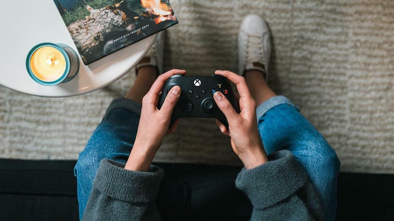 Person using Xbox controller