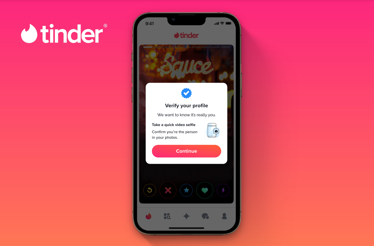 tinder display on phone with pink and orange background