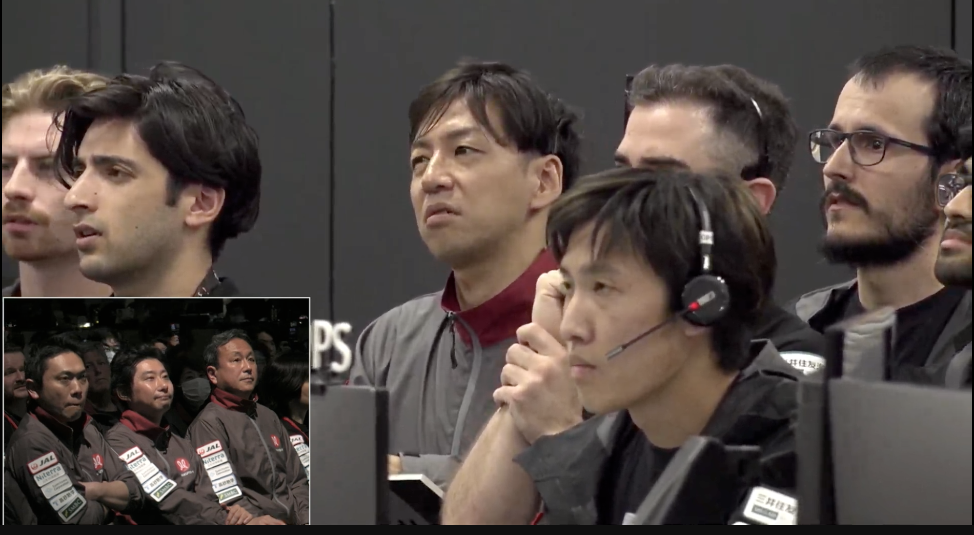 Mission controllers reacting as they await Hakuto-R landing confirmation
